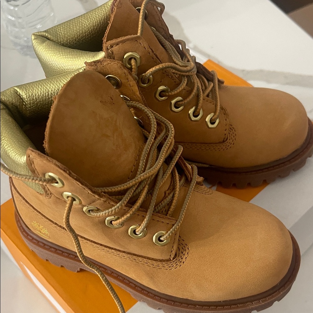 As is timberland premium boot in nubuck with good  toddler 10 see pictures